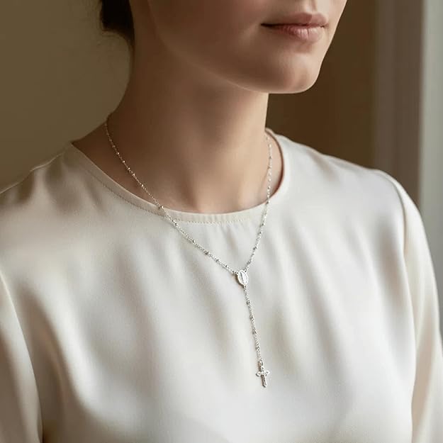 silver-plated rosary necklace featuring smooth 3 mm (0.12 inch) prayer beads, a finely detailed crucifix pendant measuring 1.3 cm (0.51 inch), and a classic Catholic design perfect for daily wear or devotional prayer.
