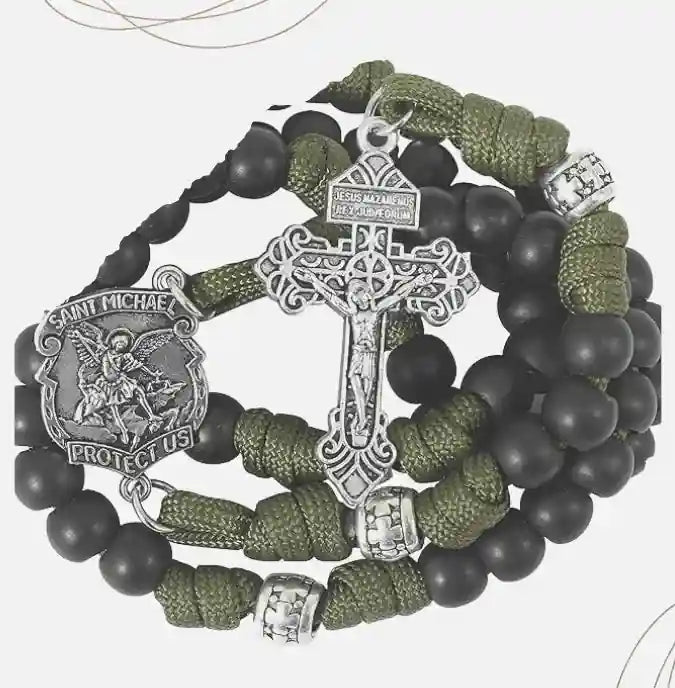 Paracord Rosary with black and green beads and Saint michael medal a white background