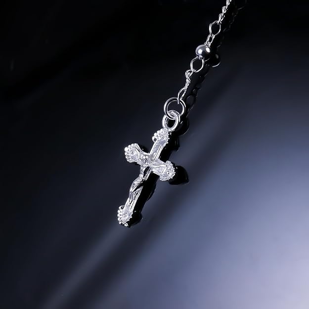 silver-plated rosary necklace featuring smooth 3 mm (0.12 inch) prayer beads, a finely detailed crucifix pendant measuring 1.3 cm (0.51 inch), and a classic Catholic design perfect for daily wear or devotional prayer.