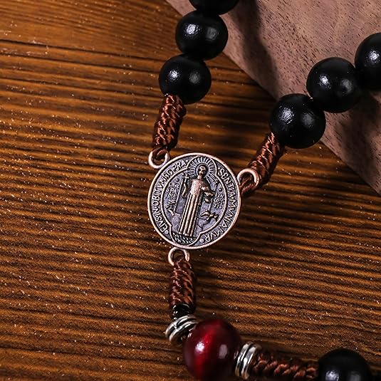 10mm black and 10mm black & dark red wood mystery beads, this rosary offers a bold, strong design that’s perfect for men. 