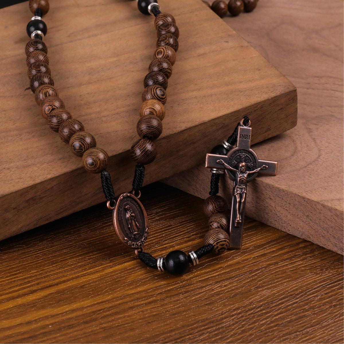 10mm olive and 10mm black wood mystery beads, this rosary offers a bold, strong design that’s perfect for men.