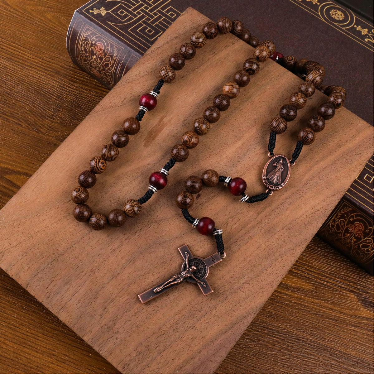 10mm olive wood beads and 12mm dark red wood mystery beads, this rosary offers a bold, strong design that’s perfect for men.