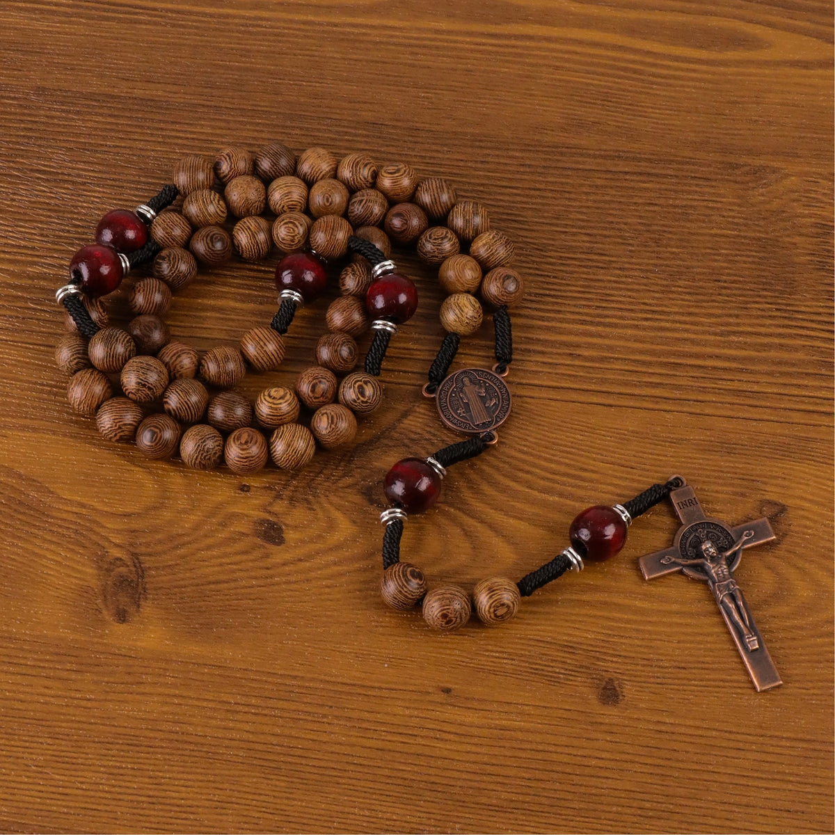 10mm olive wood beads and 12mm dark red wood mystery beads, this rosary offers a bold, strong design that’s perfect for men.