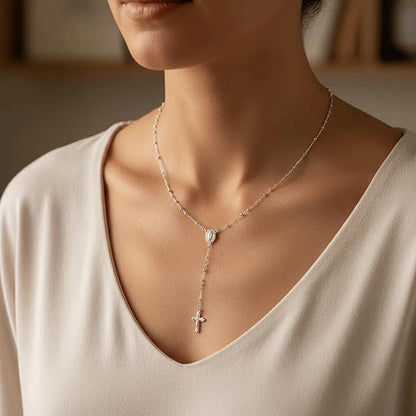 silver-plated rosary necklace featuring smooth 3 mm (0.12 inch) prayer beads, a finely detailed crucifix pendant measuring 1.3 cm (0.51 inch), and a classic Catholic design perfect for daily wear or devotional prayer.