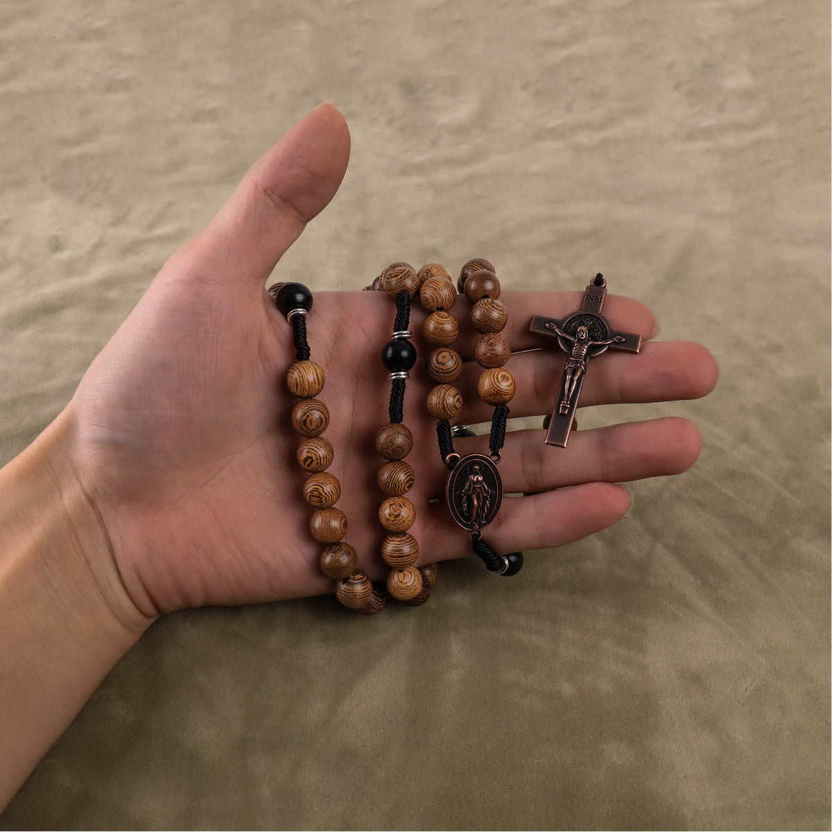 10mm olive and 10mm black wood mystery beads, this rosary offers a bold, strong design that’s perfect for men.