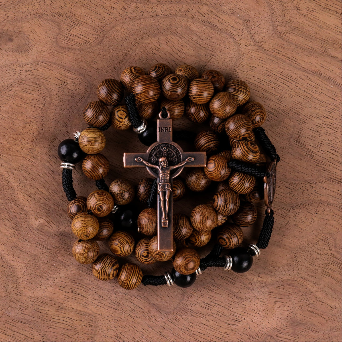 10mm olive and 10mm black wood mystery beads, this rosary offers a bold, strong design that’s perfect for men.