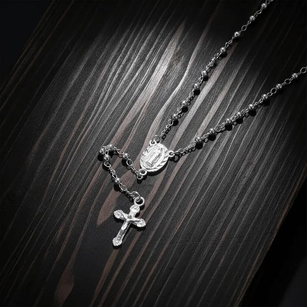 silver-plated rosary necklace featuring smooth 3 mm (0.12 inch) prayer beads, a finely detailed crucifix pendant measuring 1.3 cm (0.51 inch), and a classic Catholic design perfect for daily wear or devotional prayer.