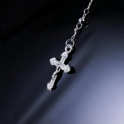 silver-plated rosary necklace featuring smooth 3 mm (0.12 inch) prayer beads, a finely detailed crucifix pendant measuring 1.3 cm (0.51 inch), and a classic Catholic design perfect for daily wear or devotional prayer.