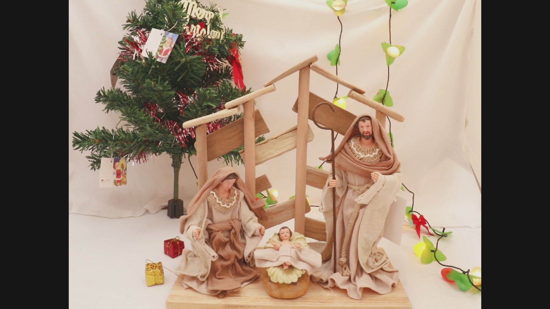 Load video: Pine Wood Nativity Set Holy Family in Cotton Fabric Clothes 12&quot; Resin Figurine