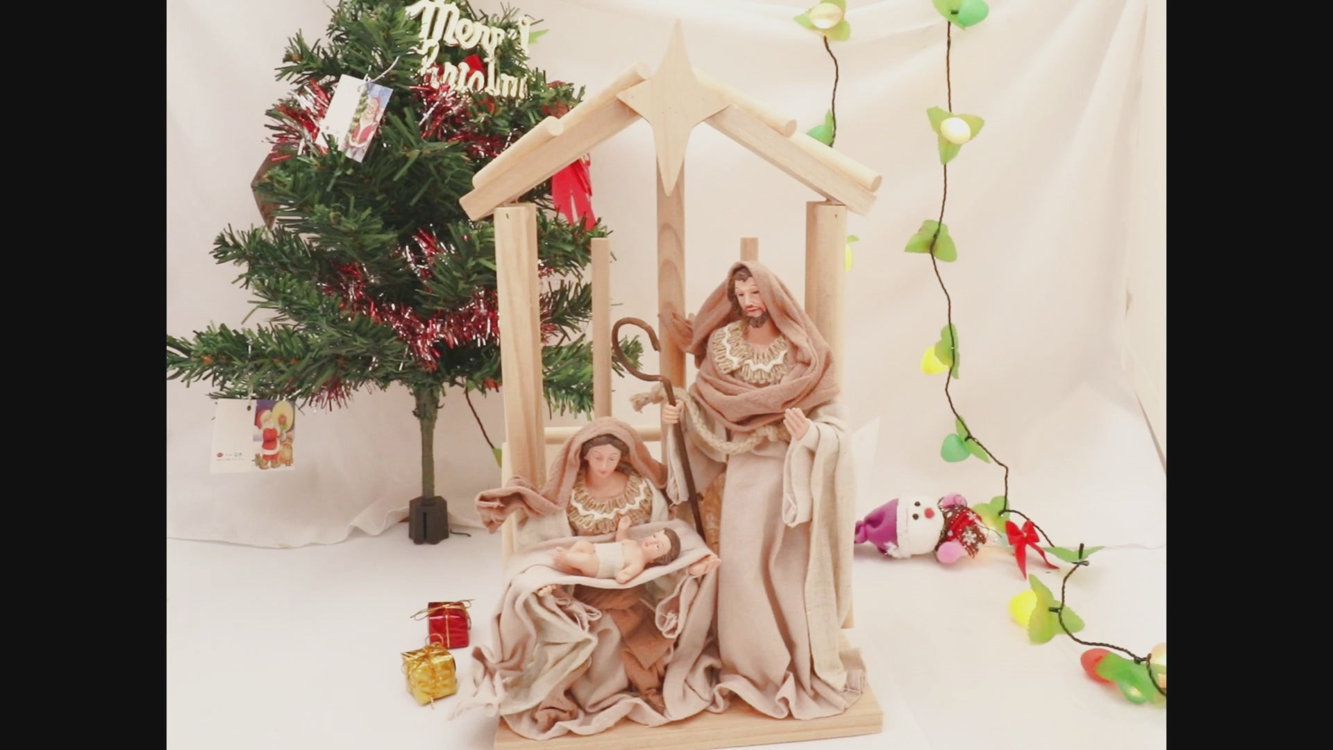 Load video: Pine Wood Nativity Set Holy Family in Cotton Fabric Clothes 14&quot; Resin Figurine