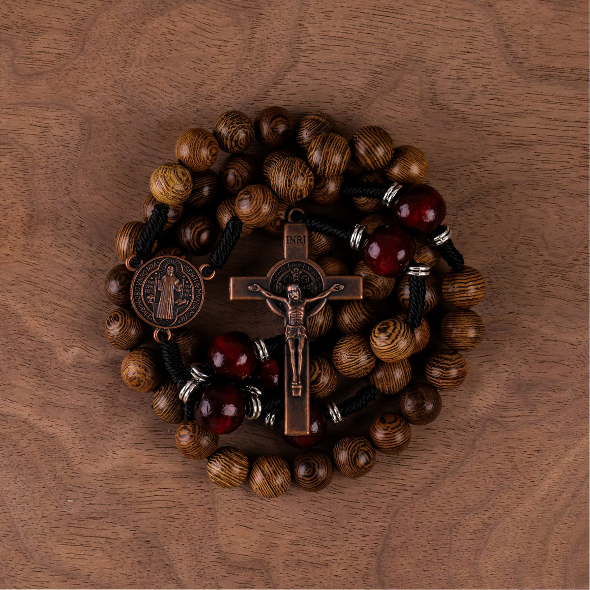 10mm olive wood beads and 12mm dark red wood mystery beads, this rosary offers a bold, strong design that’s perfect for men. 